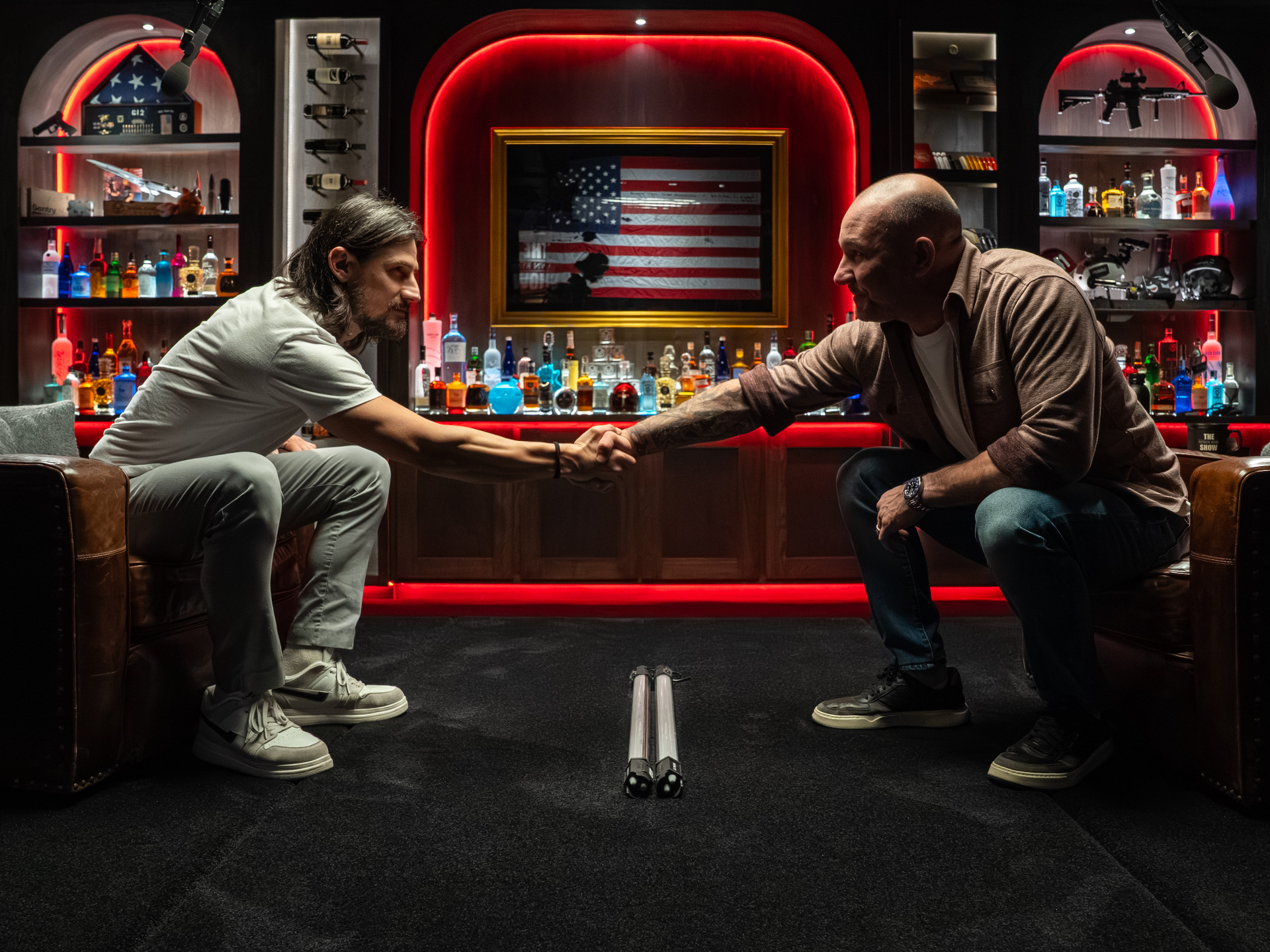 Danny Goler shaking hands in a studio setting